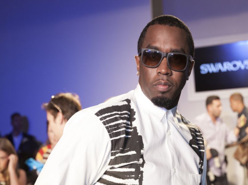 Schattig sportmaatje voor rapper Diddy tijdens ochtend workout